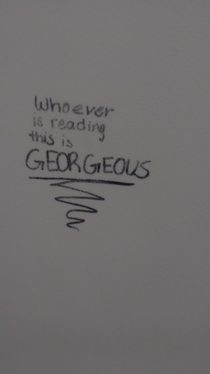graffiti: "whoever is reading this is Georgeous"
